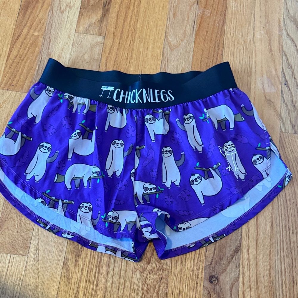 ChicknLegs Women's Purple Athletic Shorts with Sloth Print